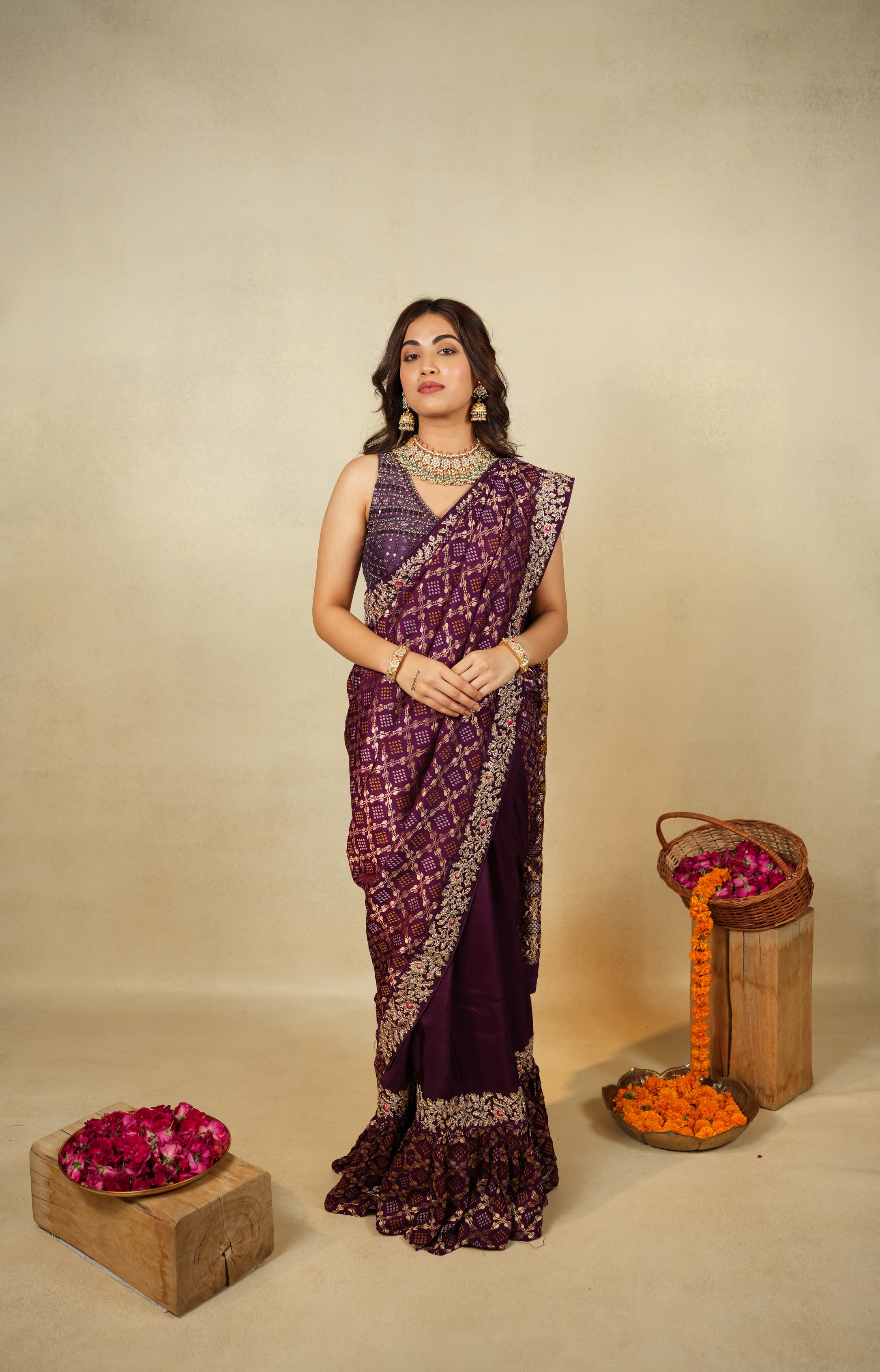 Regal elegance with this stunning plum saree