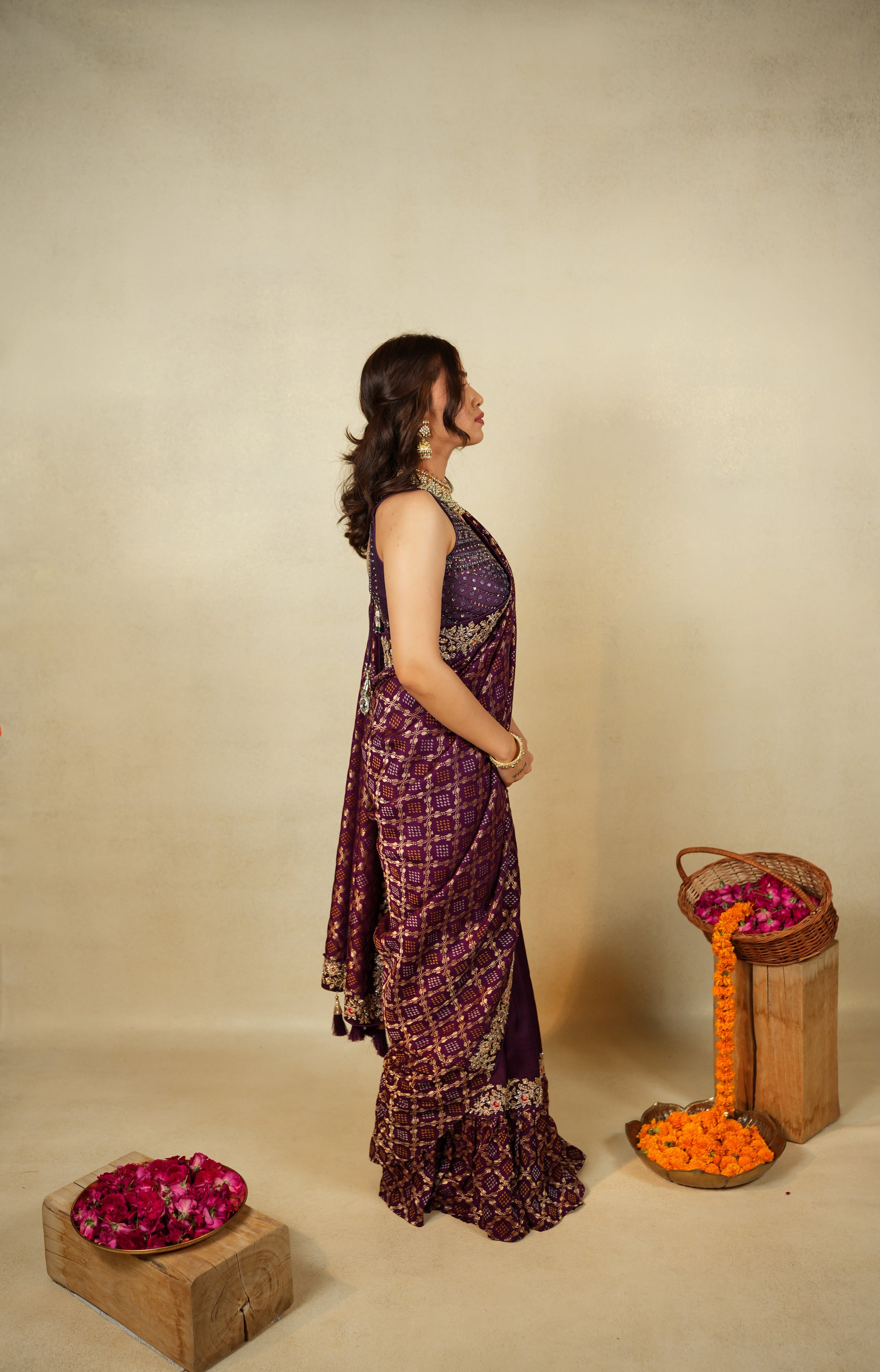 Regal elegance with this stunning plum saree
