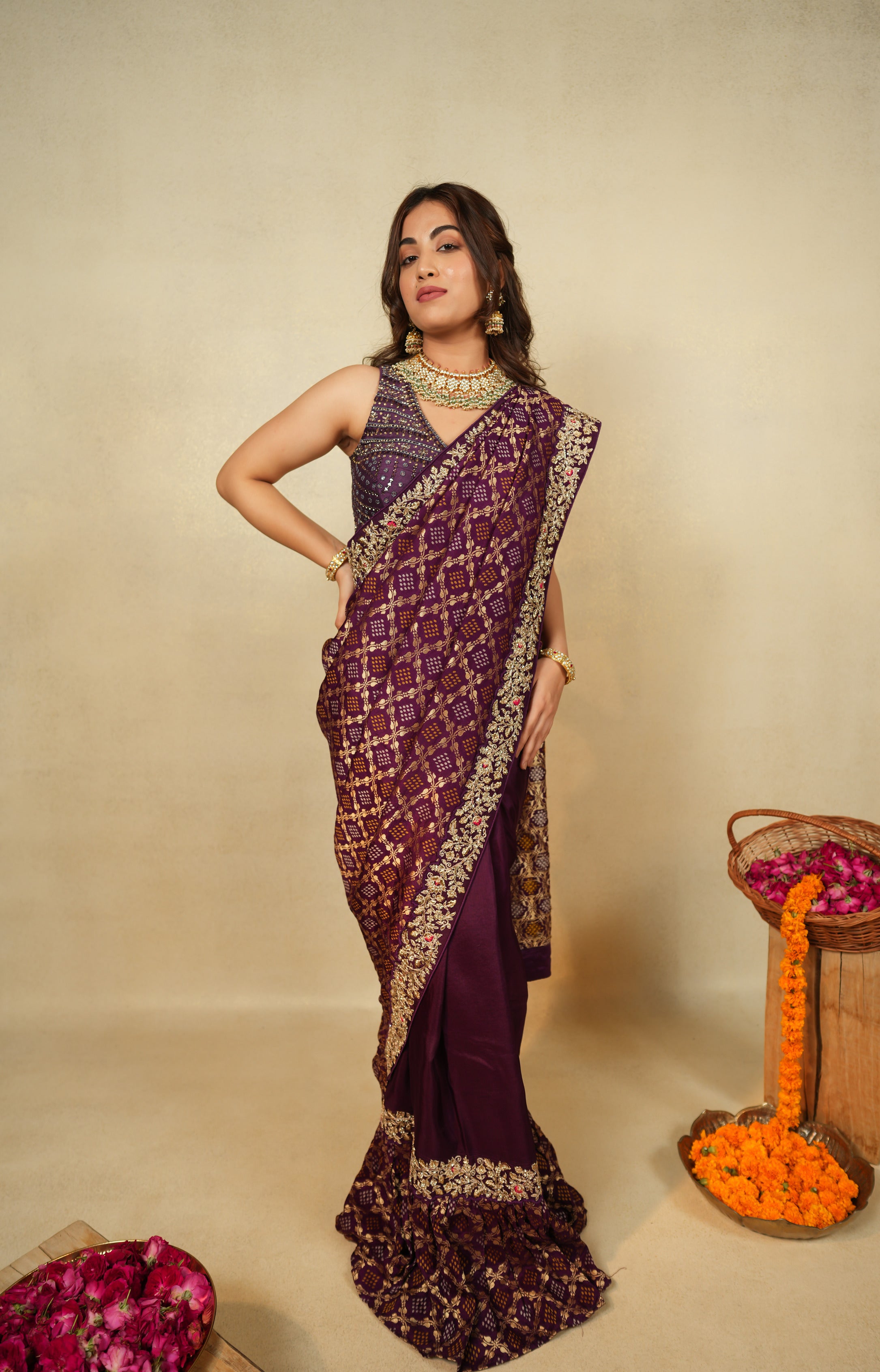 Regal elegance with this stunning plum saree